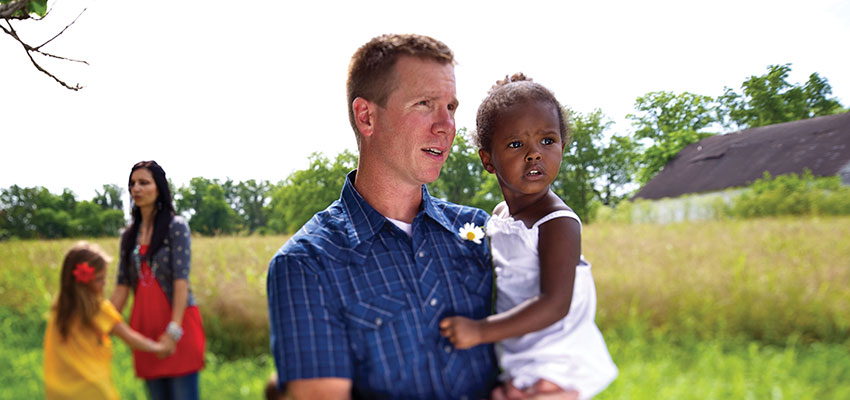 Belief in Bible motivates adoption