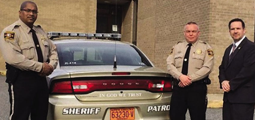 Patrol cars display national motto