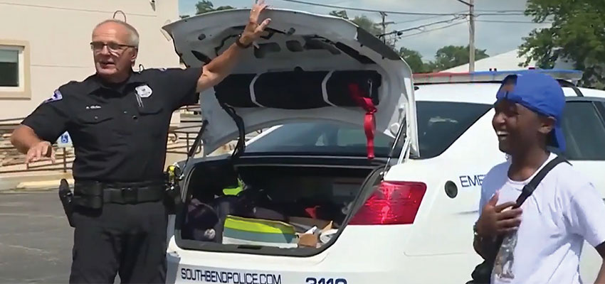 Officer helps with lemonade stand