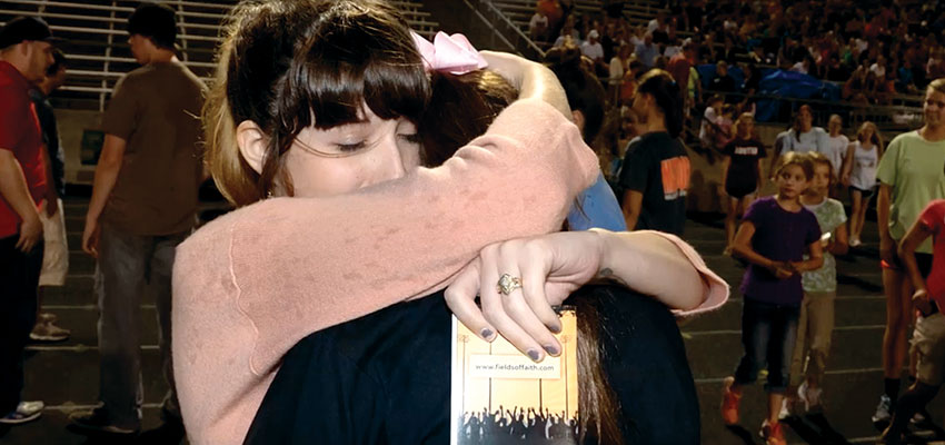 Student athletes worship, share during FCA Fields of Faith event