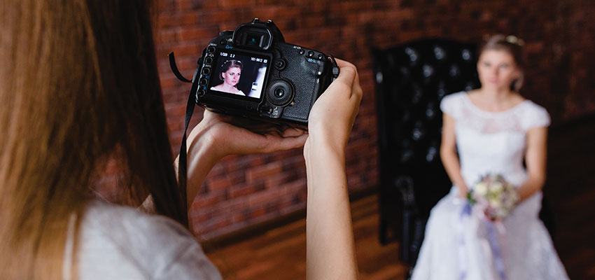 Christian photographer wins first round of court battle